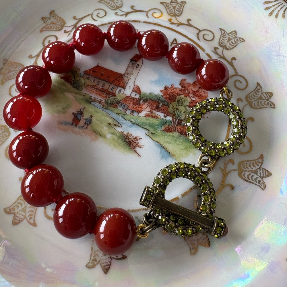 Heidi Daus Elegant Red Beaded Bracelet with Green Accents